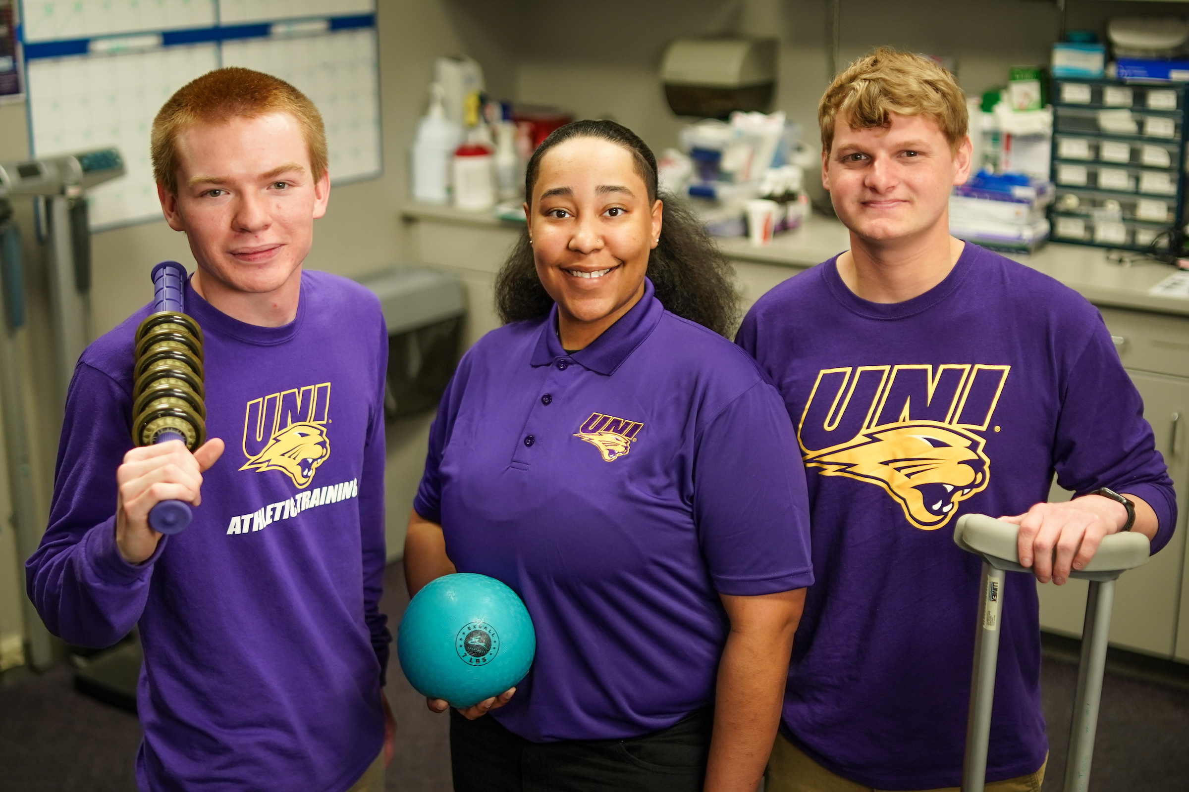 Athletic training students in the McLeod training room.