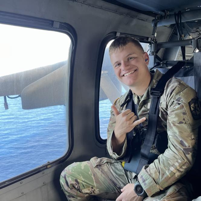 UNI ROTC cadet in plane