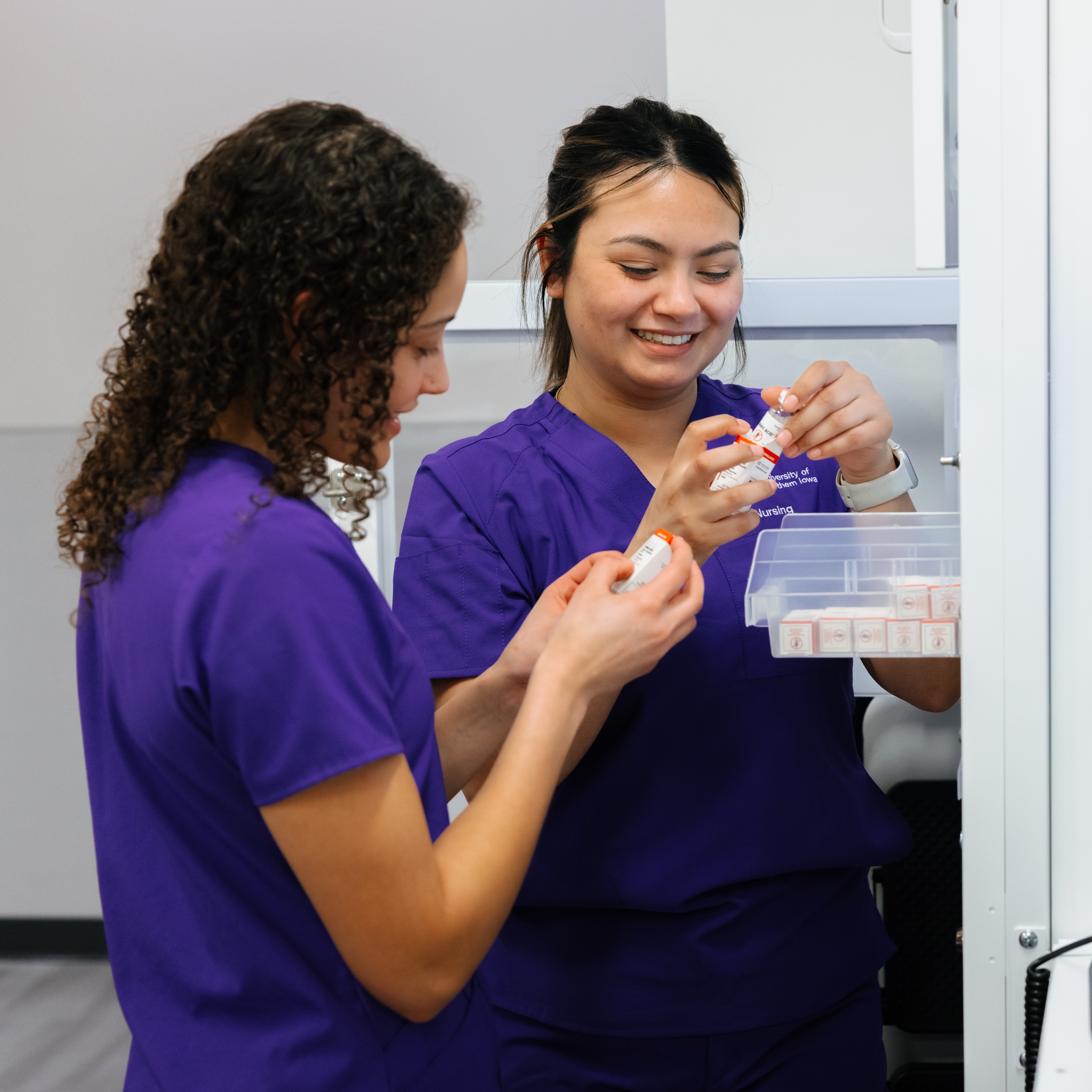 Nursing students in medication administration area