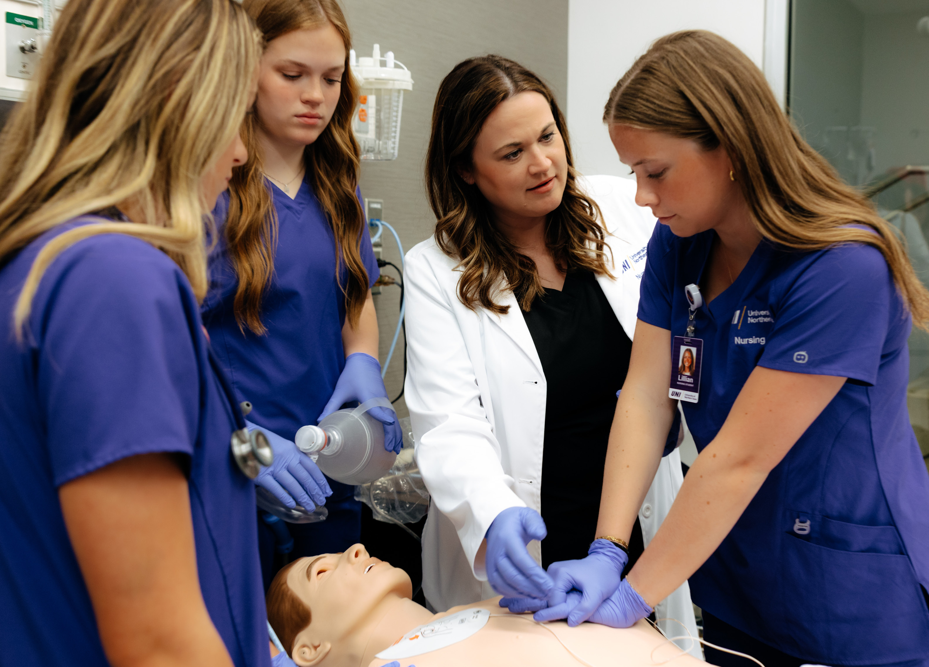 Nursing professor Heit with students