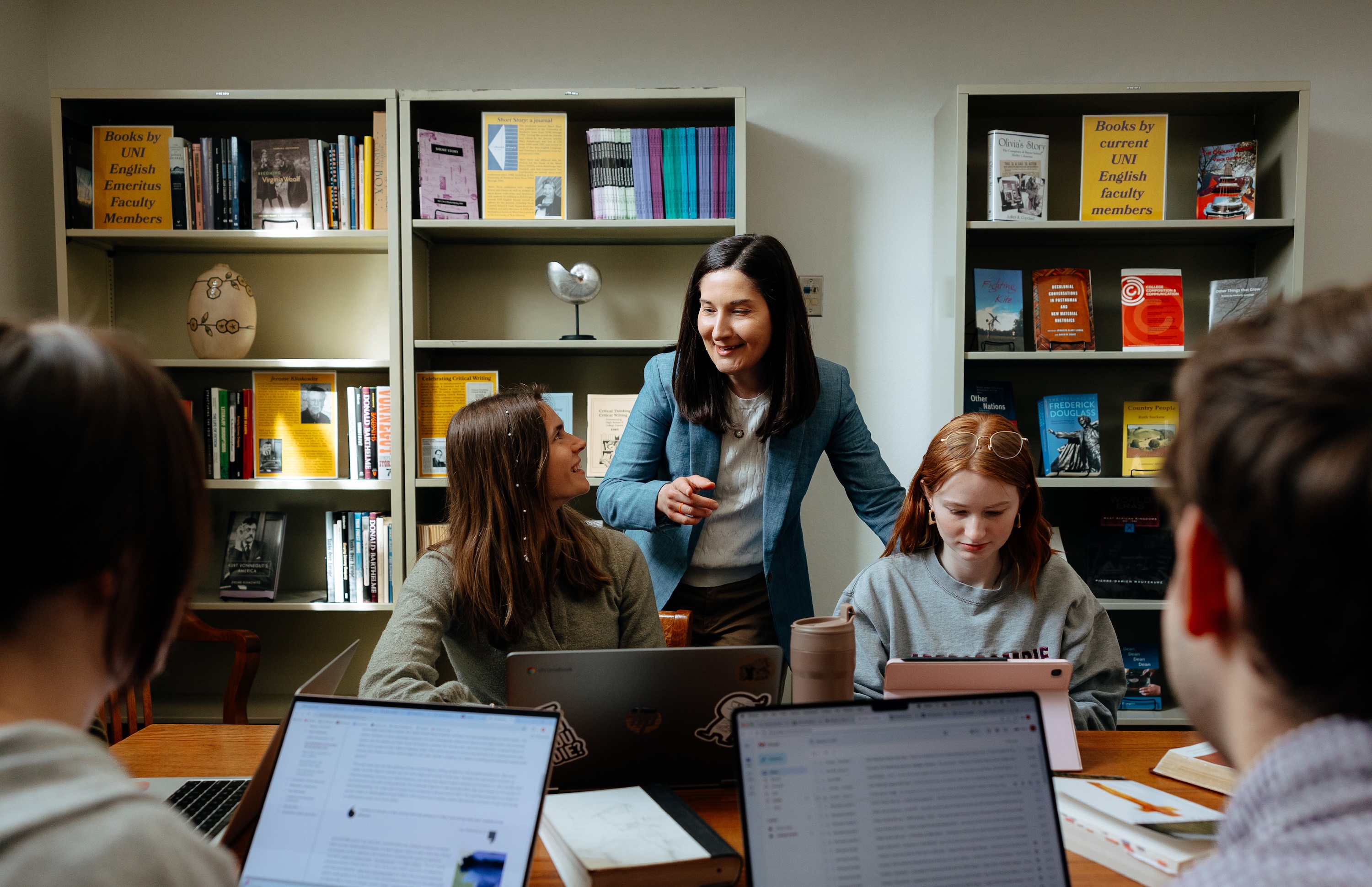 Teacher Helping Students