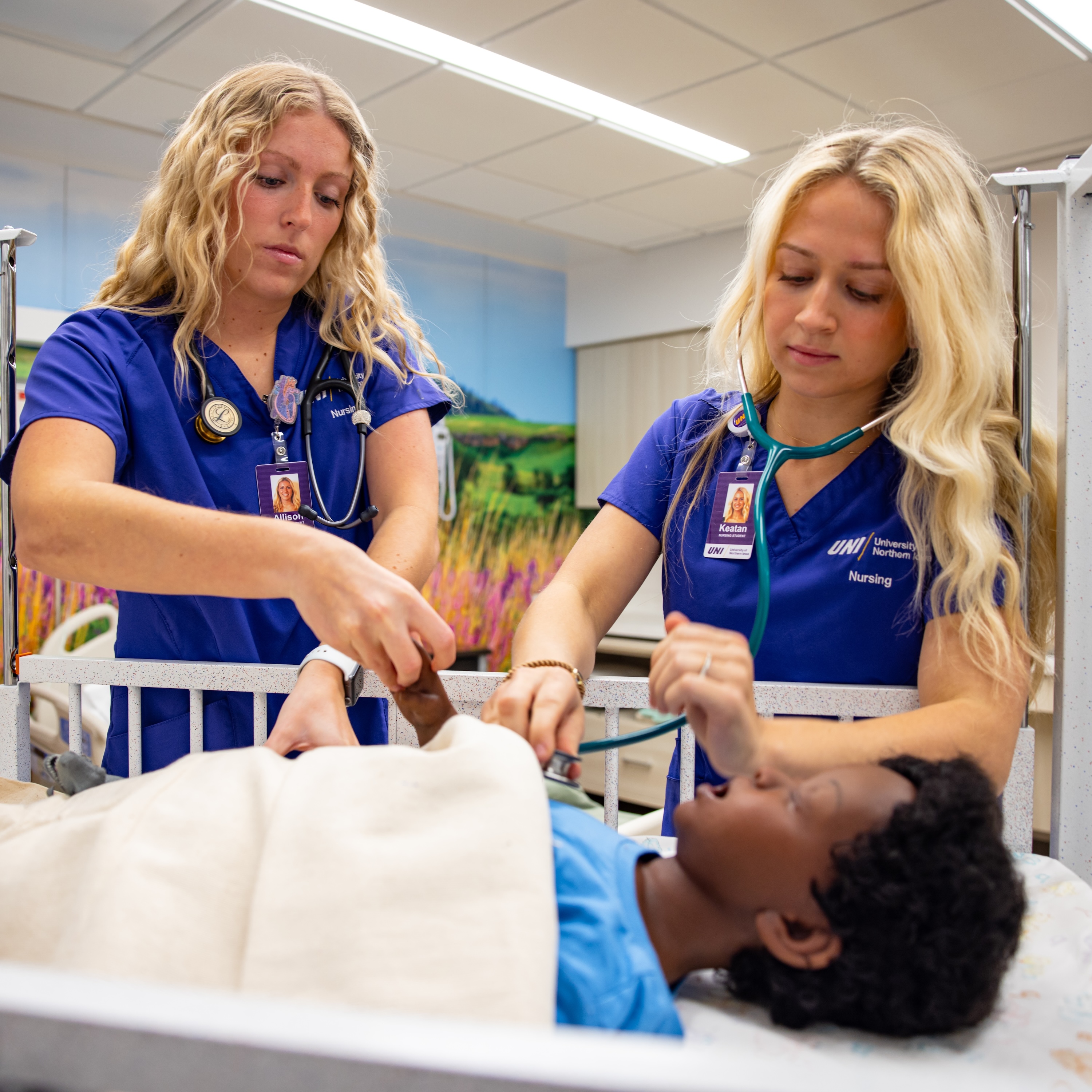 Nursing students in pediatric simulation suite