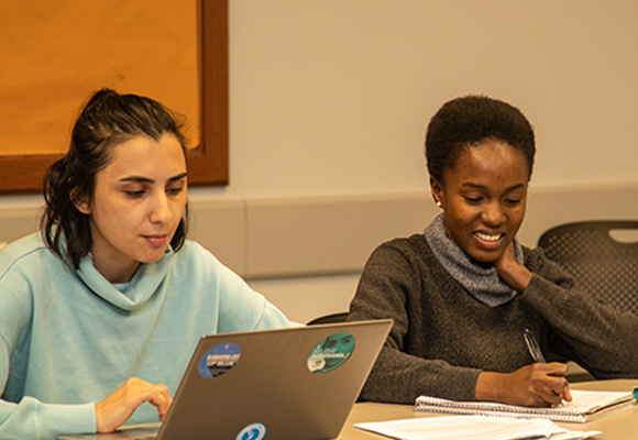 Students filling out scholarships